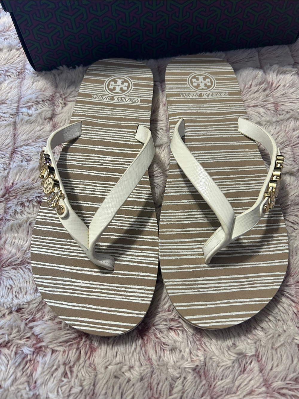 Tory Burch White Strap Striped Footbed Flip Flops with Gold Logo Charms size 9